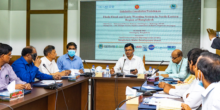 Birendra Bajracharya of ICIMOD provides an overview of SERVIR HKH tools customized for Bangladesh at the stakeholder consultation workshop in Sunamganj, Bangladesh, on 31 March 2022. Sunamganj's Deputy Commissioner and District Magistrate, Md. Jahangir Hossain, chaired the meeting and BWDB's Chief Engineer – Hydrology, Md. Mizapur Rahman, served as the Chief Guest, with local stakeholders in attendance. ICIMOD supported the FFWC in organizing stakeholder consultation workshops on flash flood and early warning systems in flood prone districts in Bangladesh's north-eastern region. (Photo credit: ICIMOD/Utsav Maden)