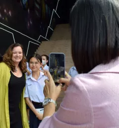 Karen St. Germain with student at Southeast Asia launch event