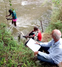 Collecting data from equipment installed by WARIDI along the Wami River. Photo credit: USAID/WARIDI. See https://flic.kr/p/2fFSn5s